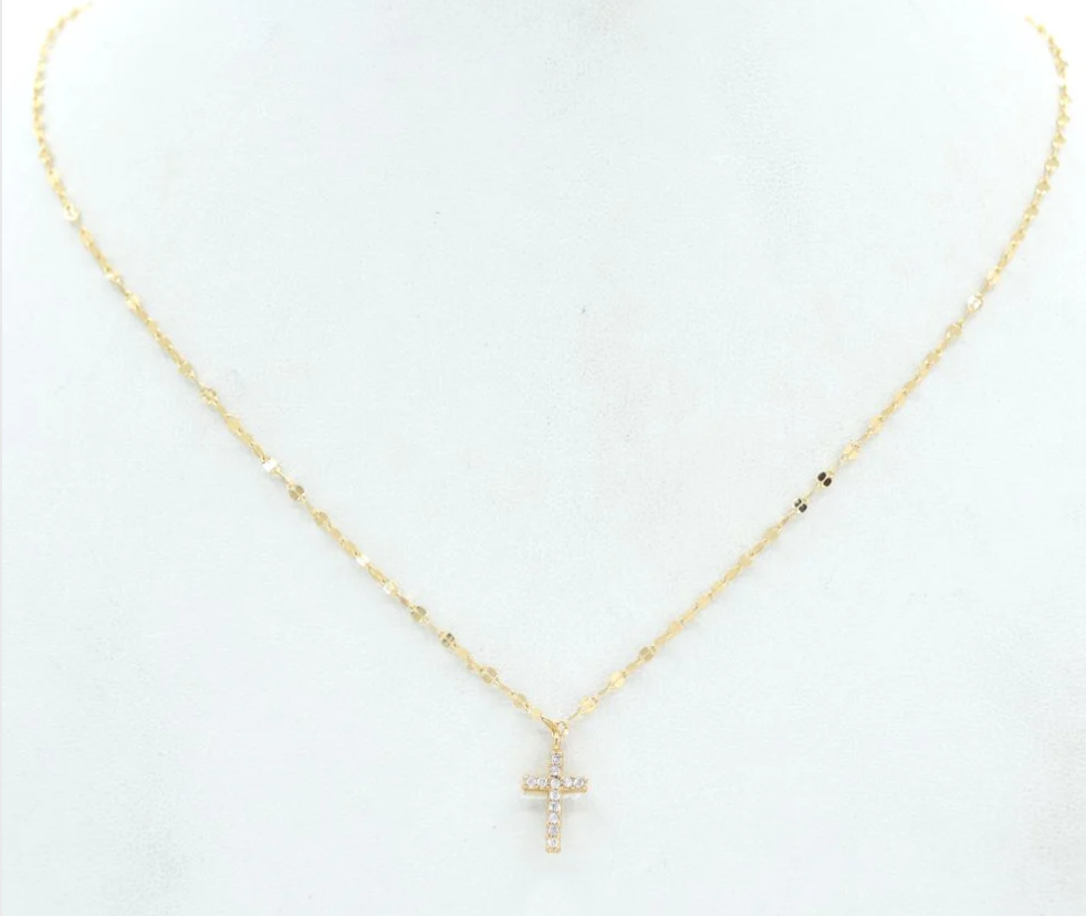 Gold necklace with a small cross pendant